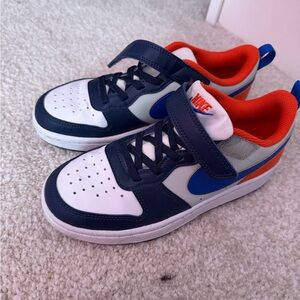 Nike Kids' Blue and White Sneakers with Orange Accents